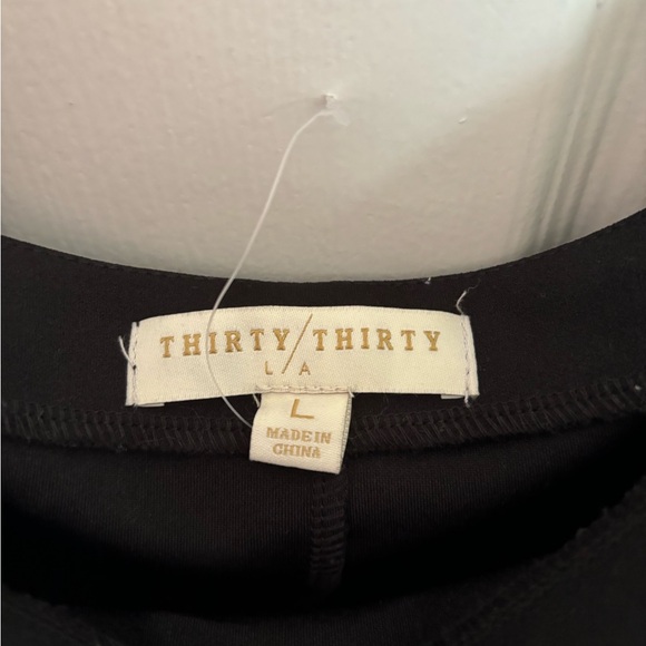 Black mini dress with long mesh sleeves and attached pearls - Picture 2 of 3